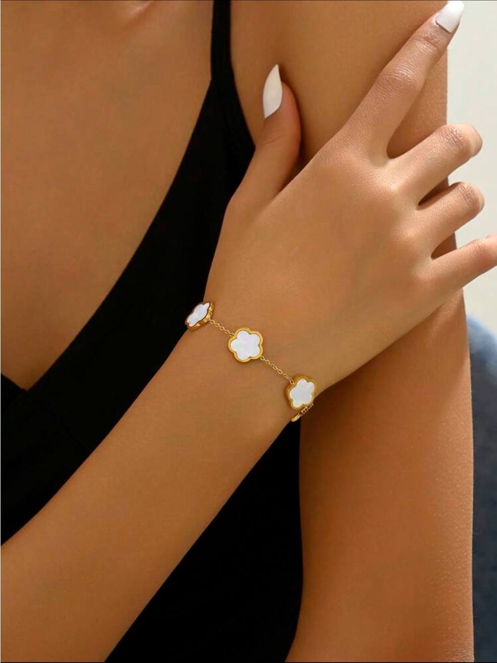 Amazon Gold-Tone Bracelet with White Clover Panels